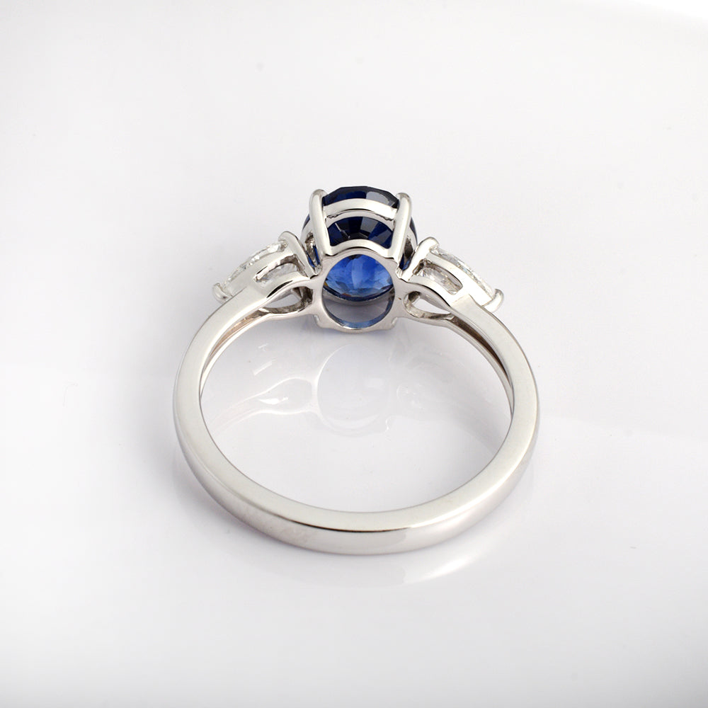 Handmade blue sapphire ring in 14K solid gold with diamond accents, perfect for September birthdays, engagements, or anniversaries.