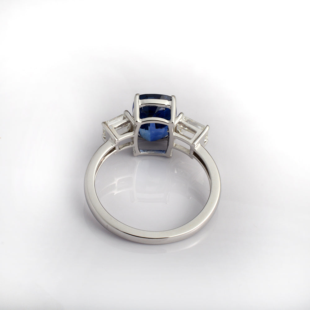 Natural blue sapphire engagement ring with emerald cut diamonds in 14K white gold, September birthstone luxury gemstone ring by Ganpati