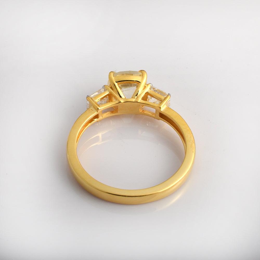 Ganpati cushion cut yellow sapphire and diamond ring in 14K yellow gold, three-stone engagement jewelry with intricate design