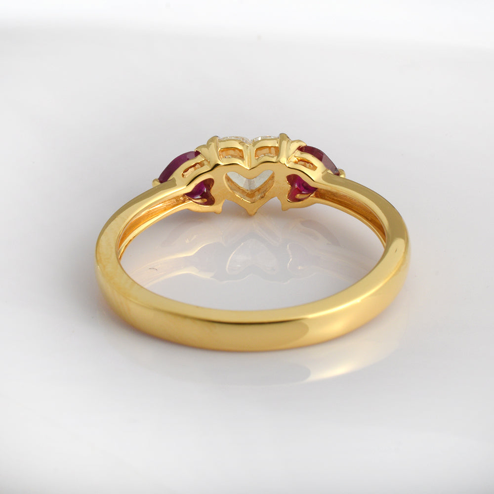 14K yellow gold ruby diamond ring with three stones, delicate minimalist design, perfect for July birthstone jewelry by Ganpati