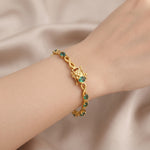 Natural emerald bracelet for women with oval green emeralds, 925 sterling silver, 18K gold vermeil, infinity link design.