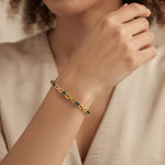 Natural emerald bracelet for women with oval green emeralds and infinity link, crafted in 925 sterling silver and 18K gold vermeil.
